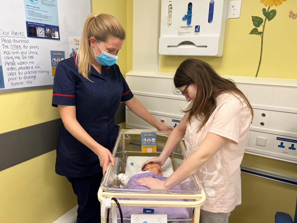 Stacey with neonatal Patient