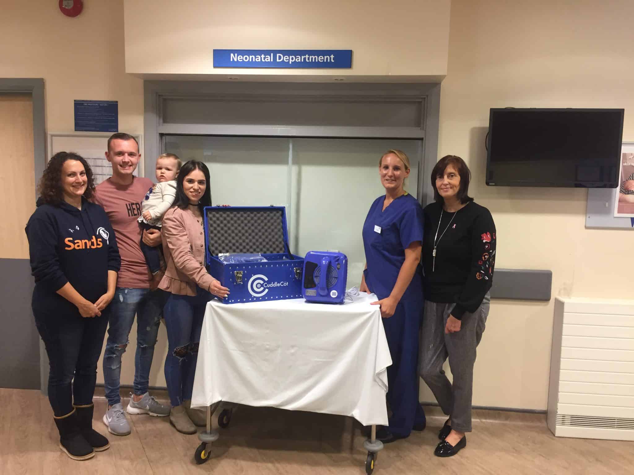 caring-couple-donate-much-needed-cuddlecot-to-neonatal-department