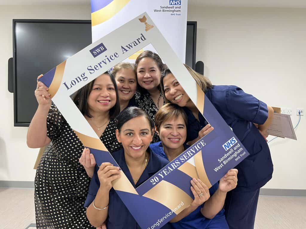 NHS staff celebrating receiving their Long Service Awards