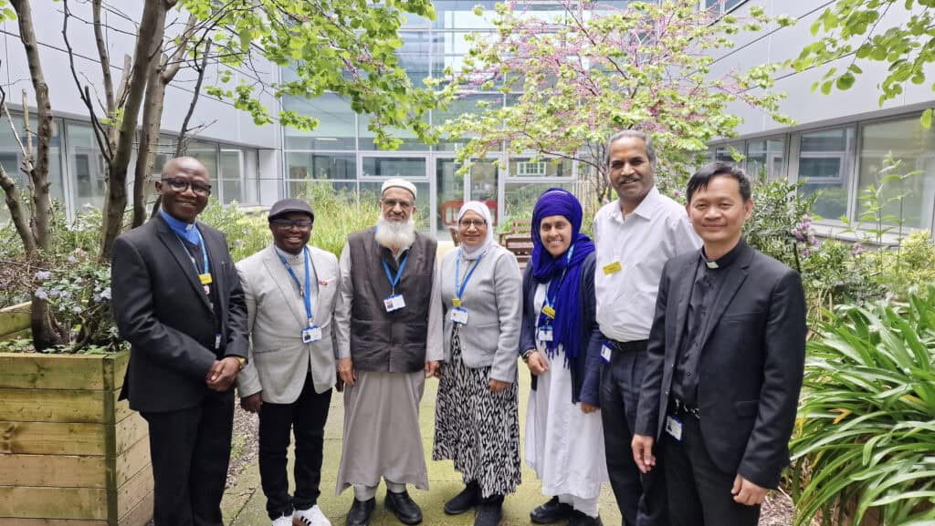Chaplaincy team outside the Multi-faith Spiritual Care Centre at the Birmingham Treatment Centre