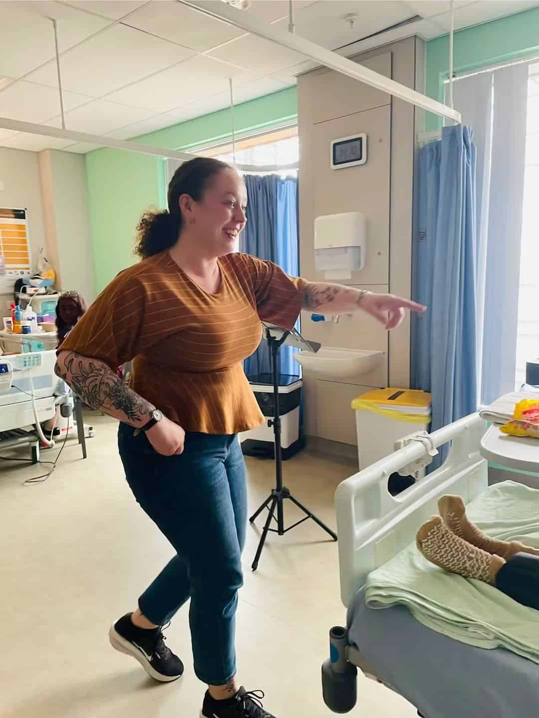 Samantha-Oxborough singing to patients