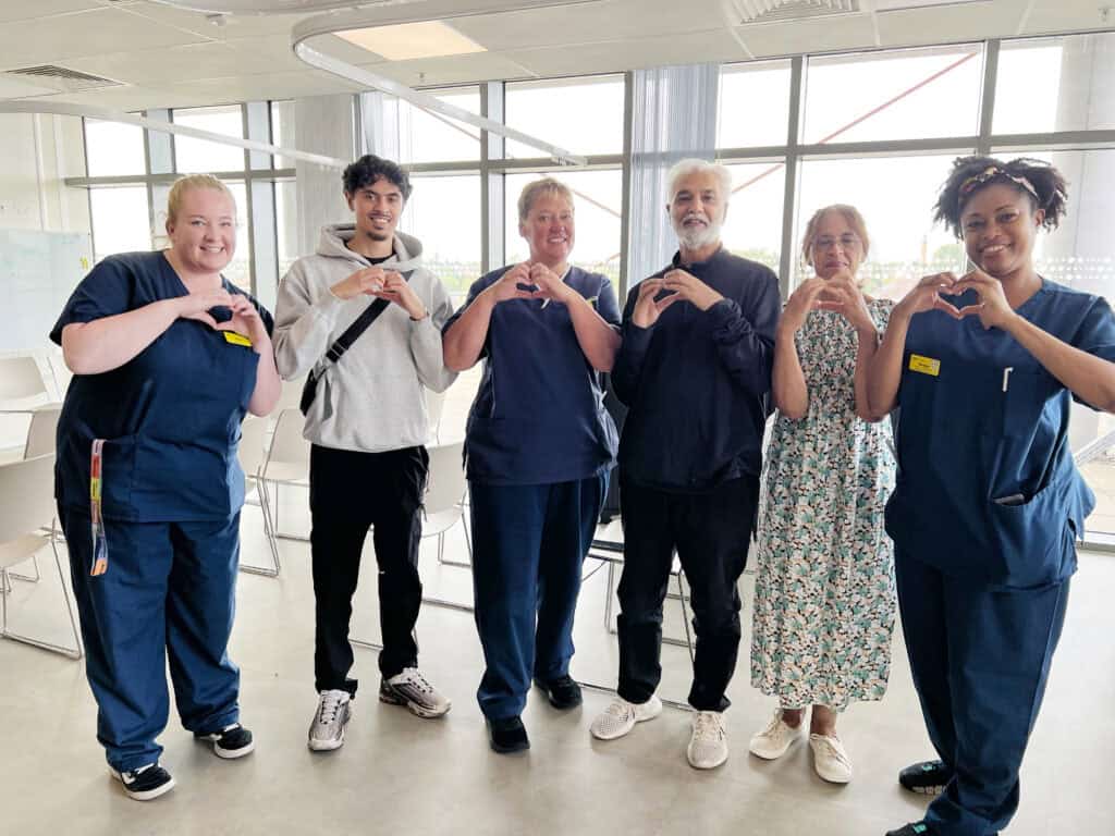 Amritpal and his wife, Pam, and son, Ruben, reunited with the ICU team who cared for him at the Midland Metropolitan University Hospital