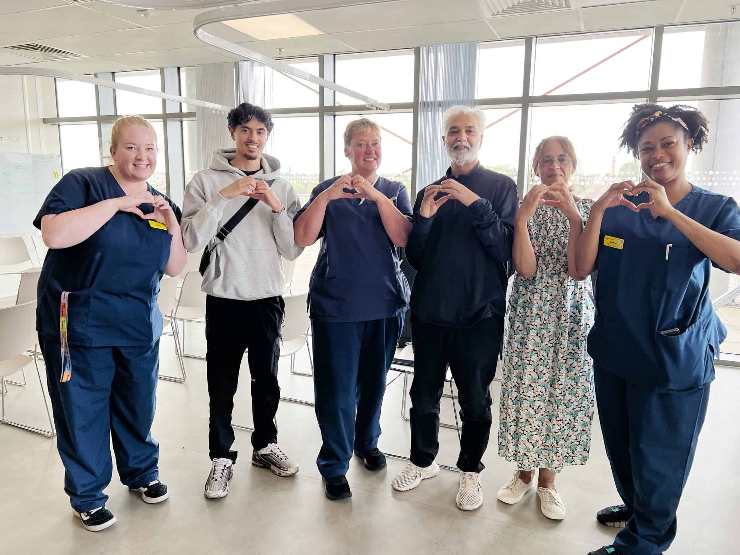 Amritpal and his wife, Pam, and son, Ruben, reunited with the ICU team who cared for him at the Midland Metropolitan University Hospital